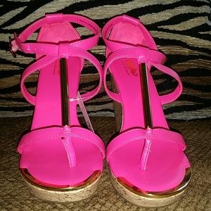 Neon pink with gold accent wedges