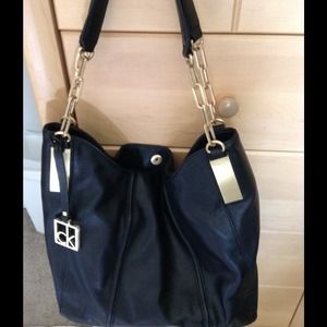 Black leather tote by Calvin Klein