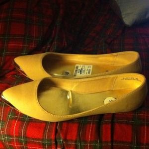 Tan flats with gold pointed toe