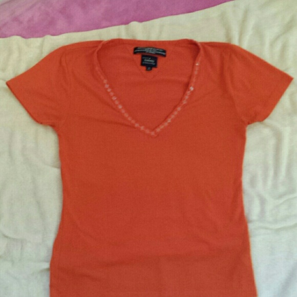 Orange Tommy Hilger top.
