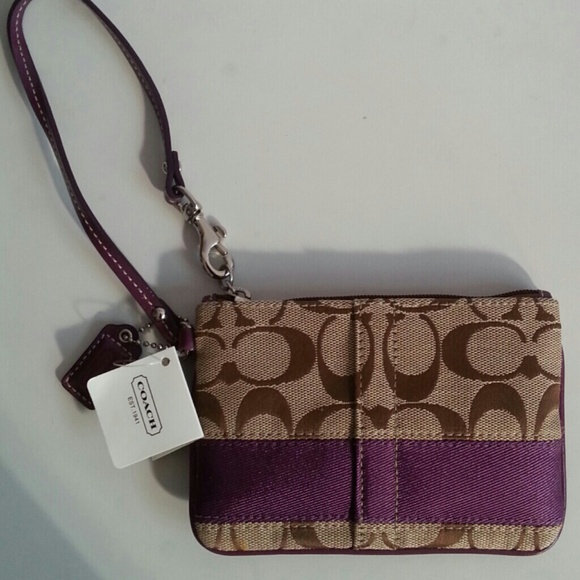 Coach khaki/plum wristlet. New with tags and box