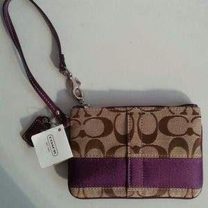 Coach khaki/plum wristlet. New with tags and box