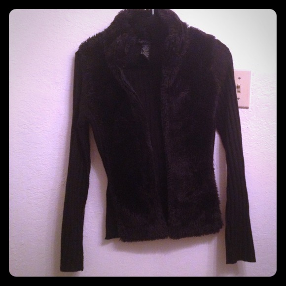 A long-sleeve shirt/sweater with fur