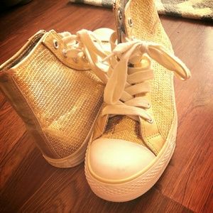 Gold shiny high top converse