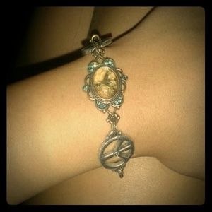 Lucky Brand gold peace sign bracelet!