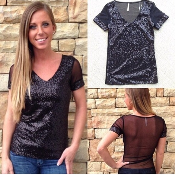 Black sequin top with sheer back.