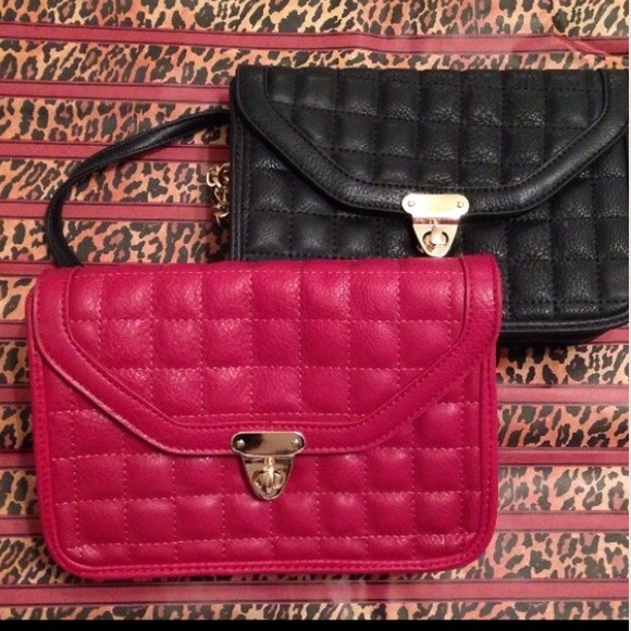 Faux leather quilted cross body bag.