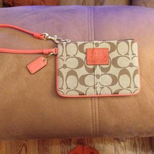 Brown coach wristlet
