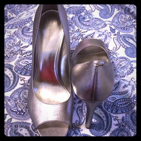 Silver Calvin Klein Pumps worn once.