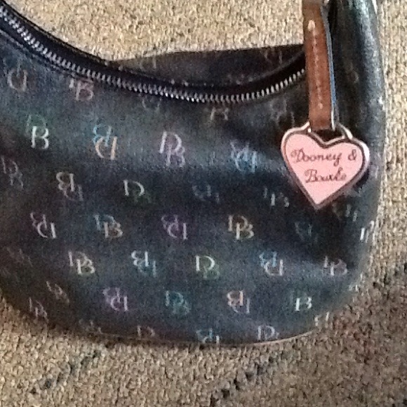 Dooney & Bourke Bag, no stains or tears. - Picture 2 of 3