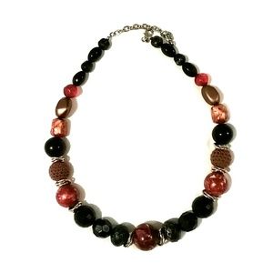 Beautiful piece! Chunky beads of red, black, and