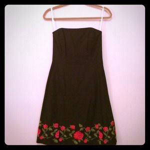 Shoshanna black strapless dress with rose detail.
