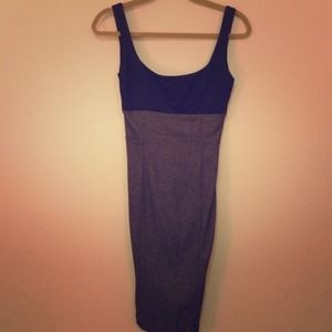 Fitted, below the knee aqua dress.