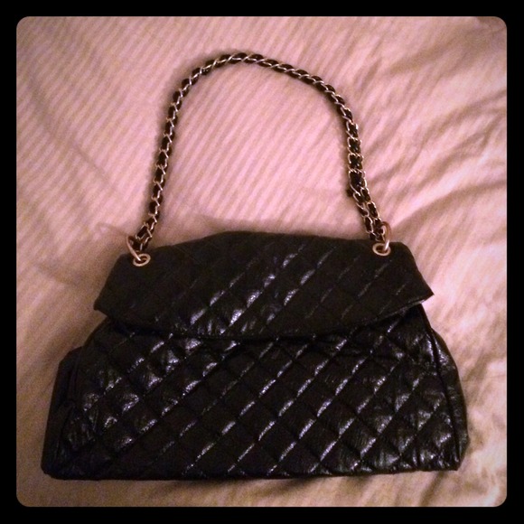Gently used black quilted purse