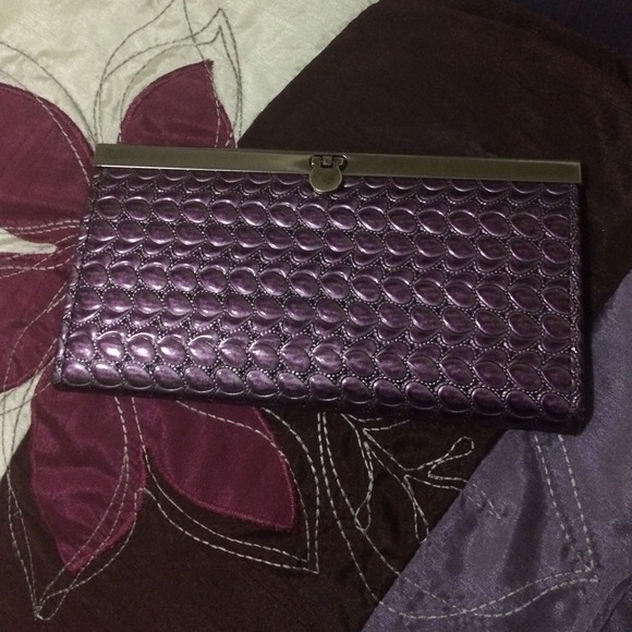 Purple acordian style wallet
