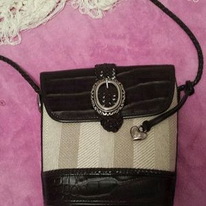 Brown and cream colored cross body bag