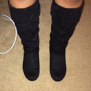 Black faux suede Rampage boots.