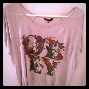 Cream colored "Obey" top