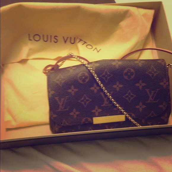 Authentic Louis Vuitton small shoulder bag.