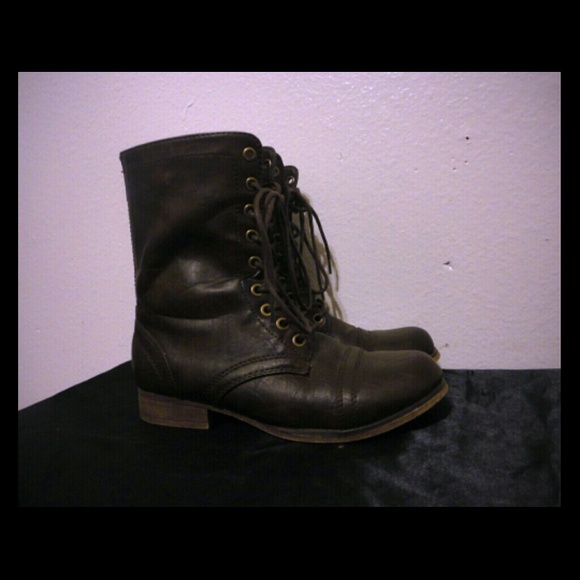 Brown combat boots.