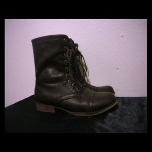 Brown combat boots.