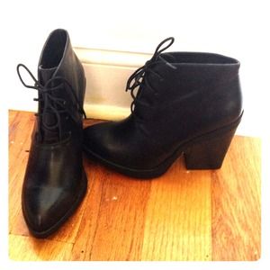 Black lace up booties.