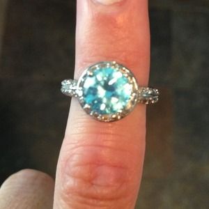 Light blue topaz halo ring