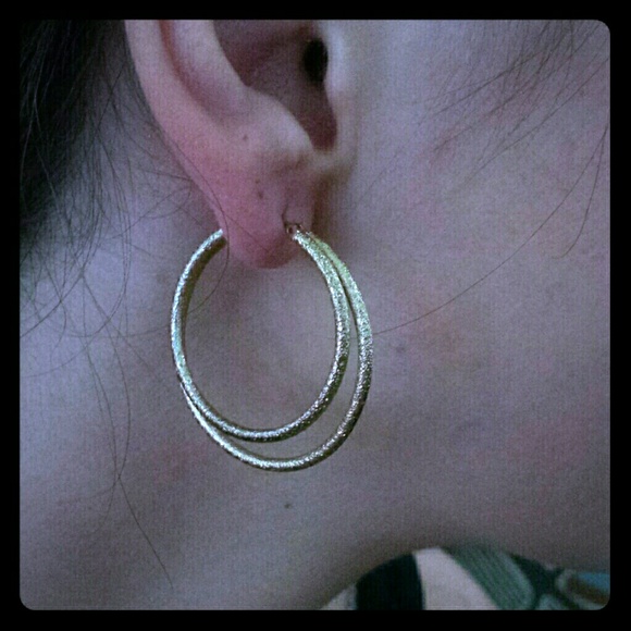 Gold colored textured double hoop earrings