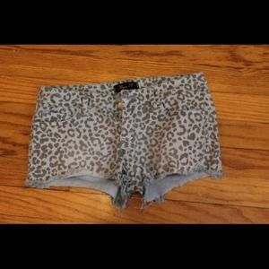 Blue leopard shorts.