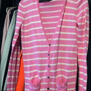 pink and white cardigan