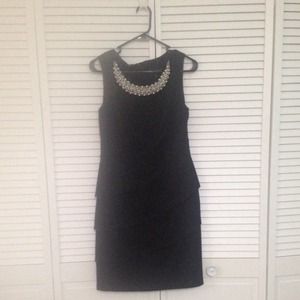 Black short dress with pearl bib