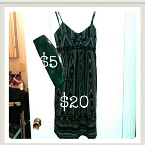 Dress with green clutch