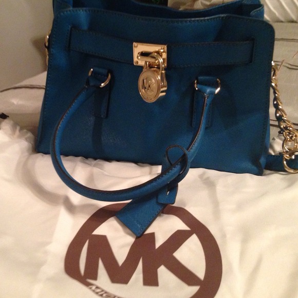 Authentic Michael Kors bag with cover bag.