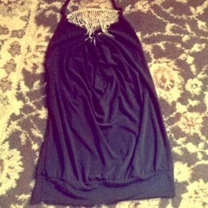 A plain black silk top with a built in necklace!