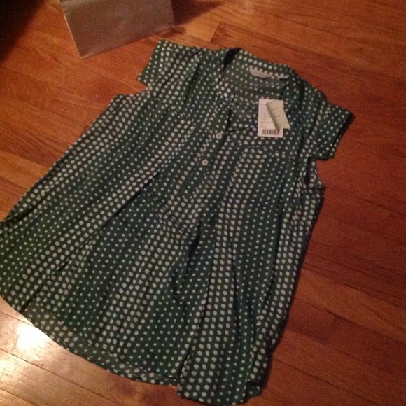 Green Anthropologie blouse with white polka dots
