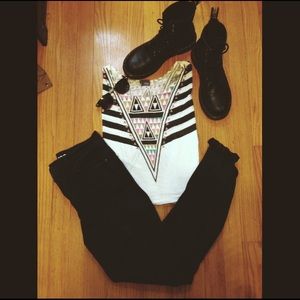 Asymmetrical crop top.