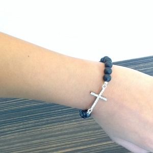 Black onyx bracket with a diamond cross