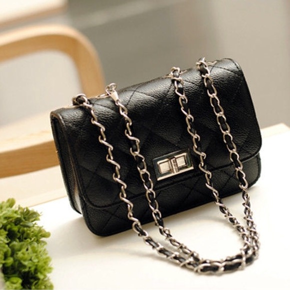 Small black quilted purse