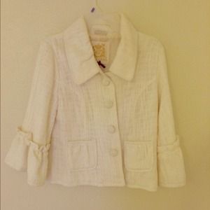 Ivory blazer with ruffle sleeves