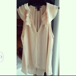 Pale pink ruffled top