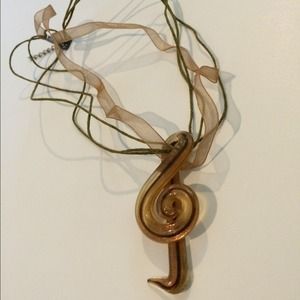 Glass treble clef neckless