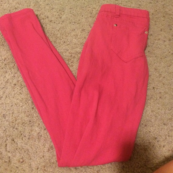 Dark pink skinny jeans