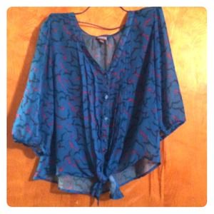 A size large Vanity bird shirt.
