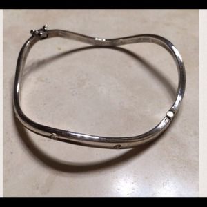 Sterling silver bracelet w/ rhinestone insets.