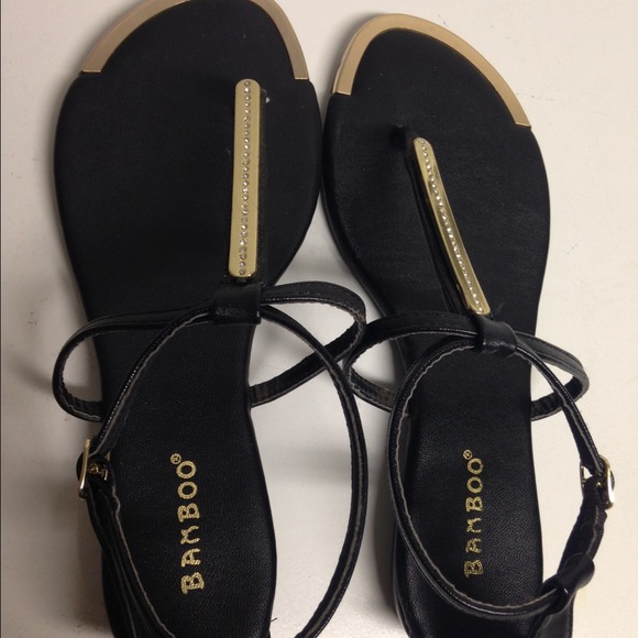 NWOT black and gold strappy sandals
