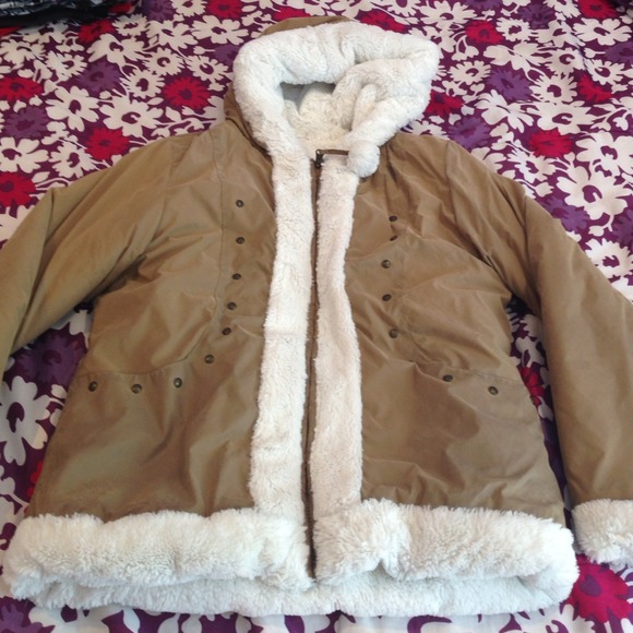 Valuable winter coat with softened sheep fur