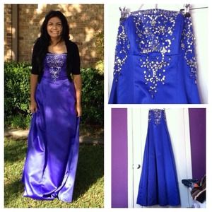 This prom dress is a cool purplish bluish color.