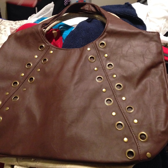 Large brown purse with metal accent - Picture 2 of 3