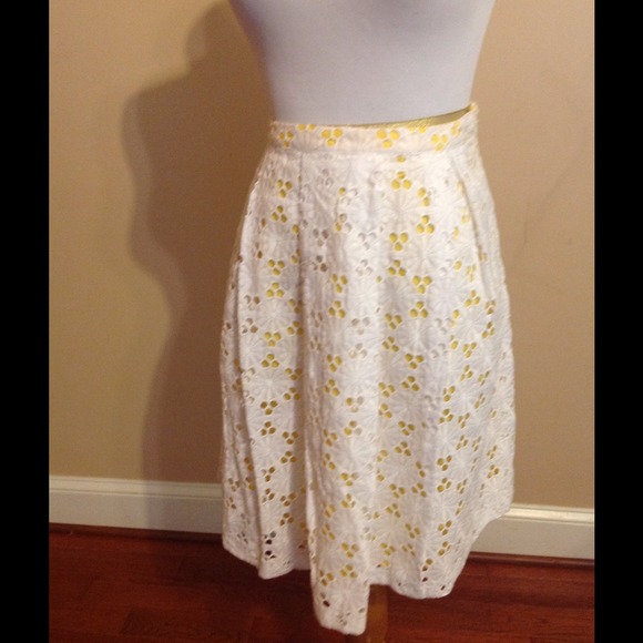 White lace with yellow lining.