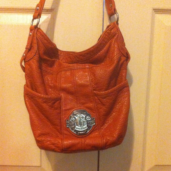 Genna De Rossi hand bag. Burnt orange for fall .